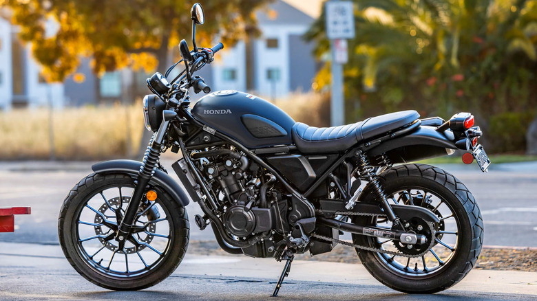 A Hond SCL500 in a parking lot