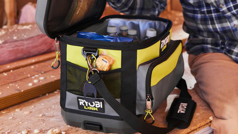 A Ryobi Link 17-inch soft cooler packed with snacks and drinks.