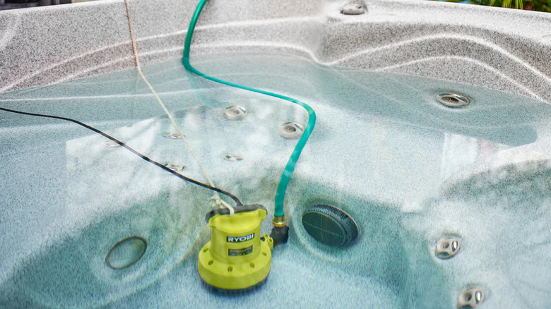 water transfer pump inside hot tub