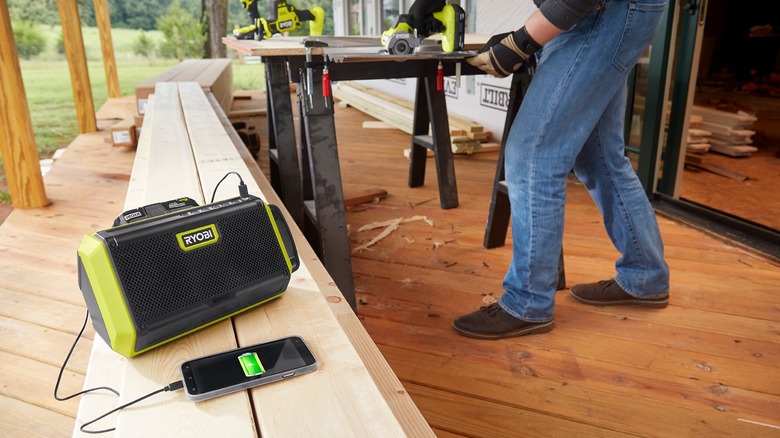 Speaker on wooden boards