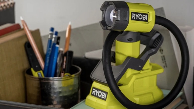 Ryobi LED light sitting on a desk top
