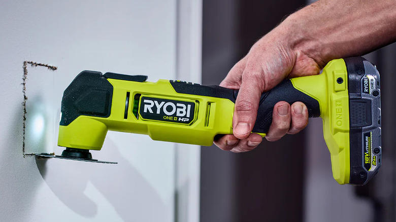 Cutting out drywall with a Ryobi PBLMT51B multi-tool