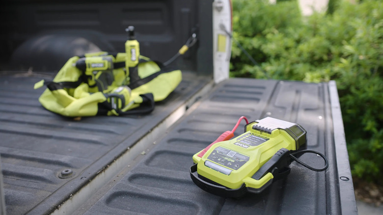 Ryobi jump starter kit on a truck