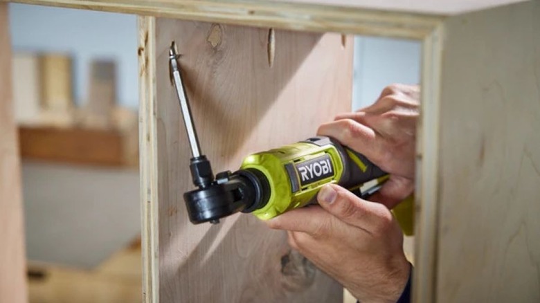 Ryobi Multi-Size Ratchet working a wood carving.