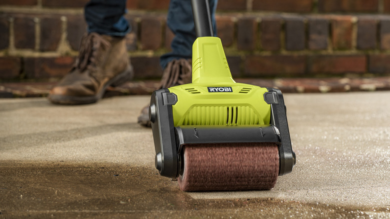 Patio cleaner being pushed