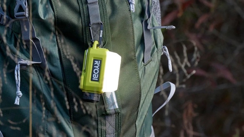 Person using Ryobi Lithium Area Light