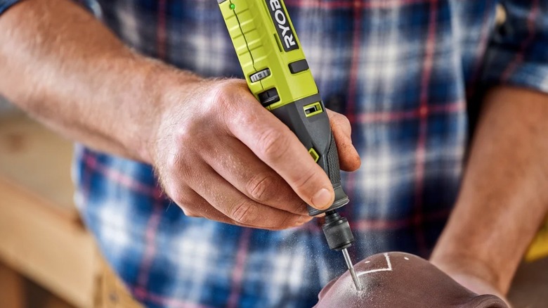 Person using Ryobi USB Lithium rotary tool