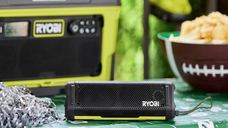 Ryobi USB Lithium speaker playing music at a tailgate party