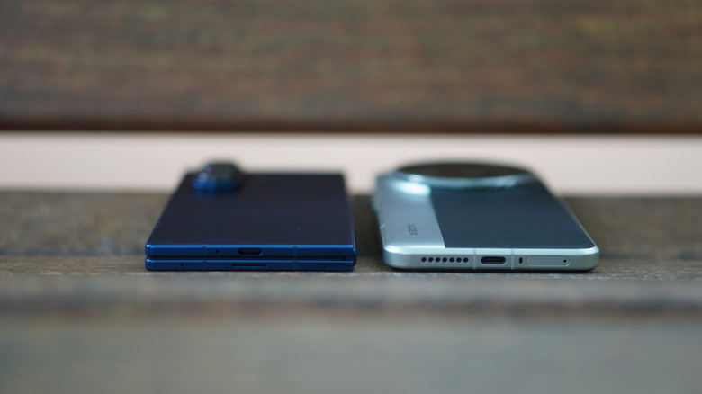 Galaxy Z Fold 7 next to a Xiaomi 15 Ultra on a bench