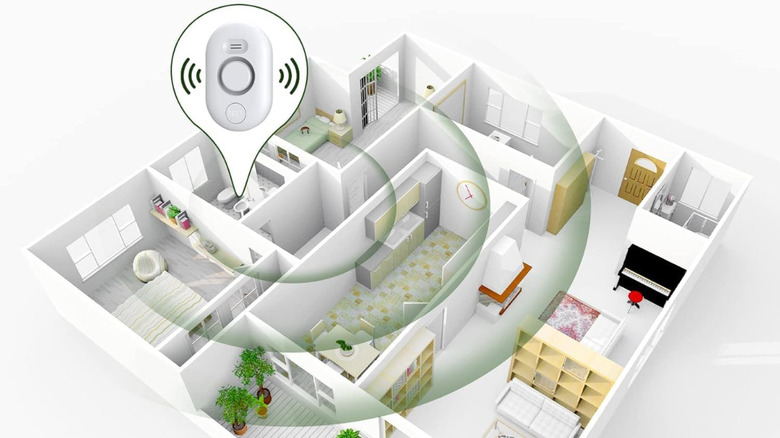 A smart water leak sensor installed inside a home