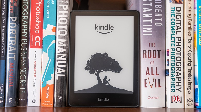 kindle on bookshelf