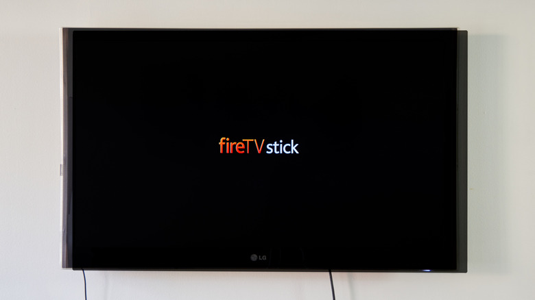 Amazon Fire TV Stick logo on an LG TV, with a black background