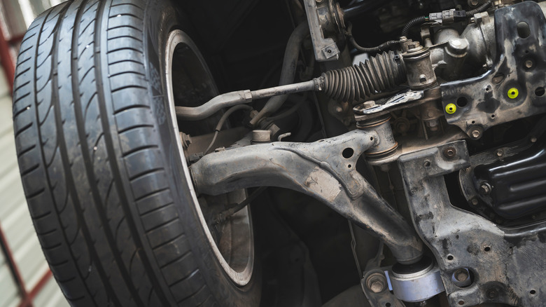 Front suspension under a car