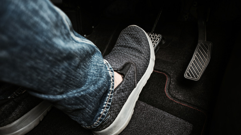 Foot pressing brake pedal