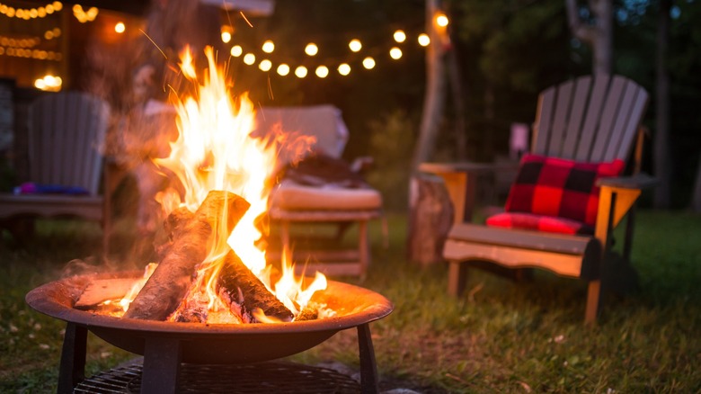 Campsite with firepit and outside lights