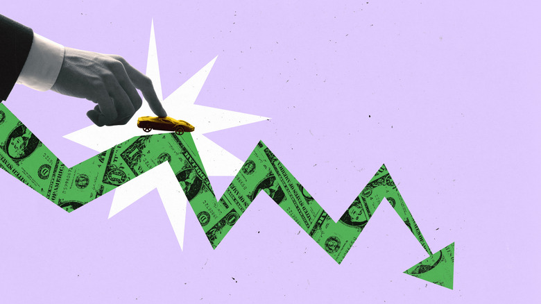 A black and white hand on a purple background pushing a yellow toy car on a green arrow with dollars bills pointing down