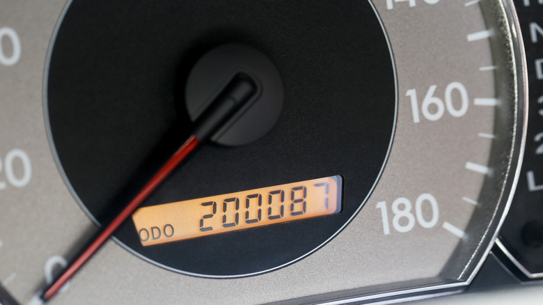 Close-up of an odometer with 200,087 miles on it