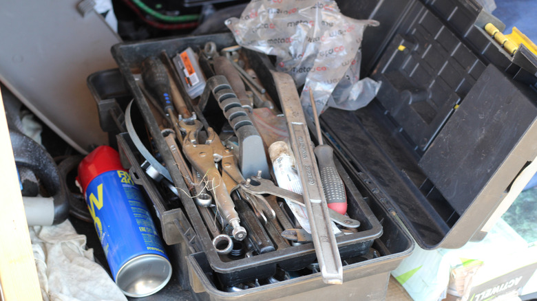 An open toolbox on a surface.