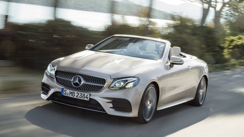 White 2017 Mercedes-Benz E-Class Cabriolet driving down road