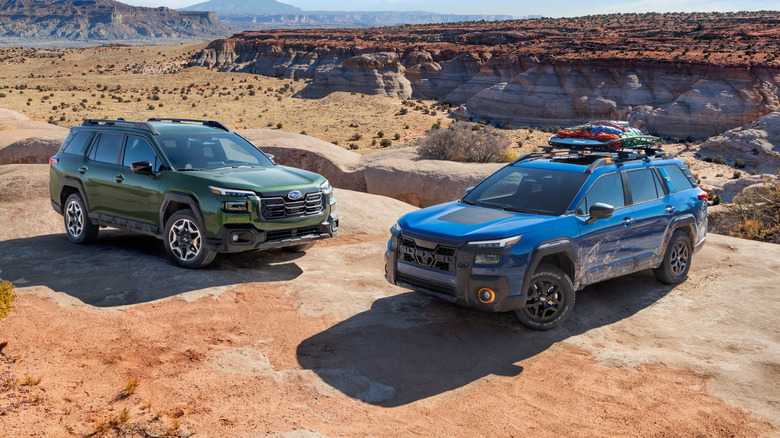 2026 Subaru Outback models parked in a mountain terrain