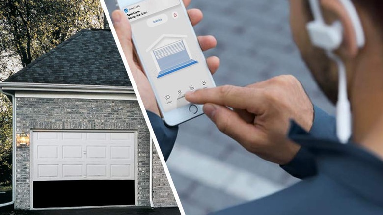 A garage door opening as a person presses the screen on their phone.