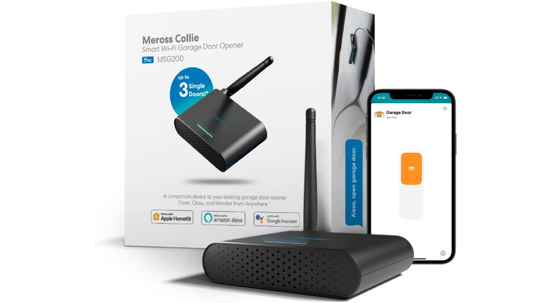 A car in a garage with bikes and a phone menu nearby.