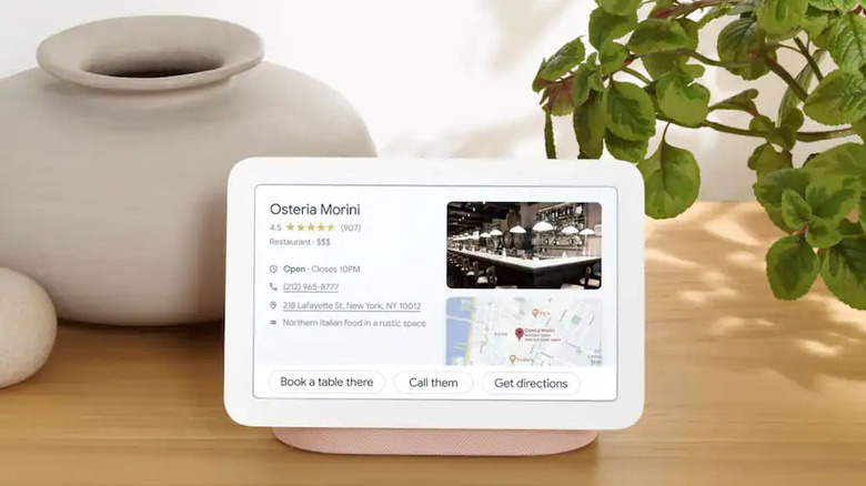 A Google Nest Hub on a living room table