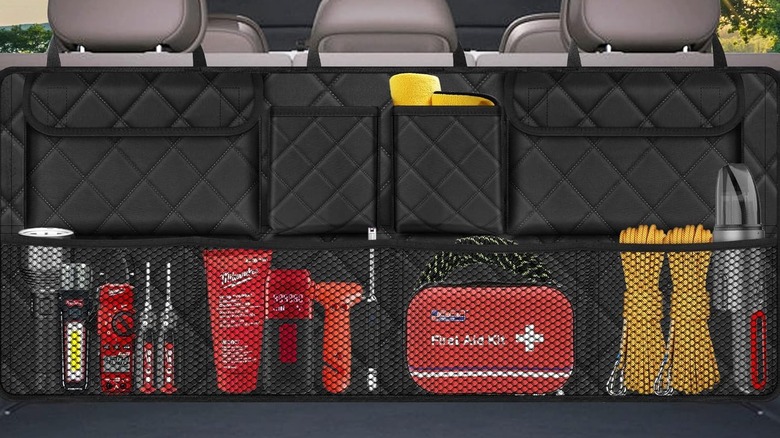 A Femuar hanging car trunk organizer in use