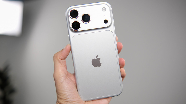 Person holding an iPhone 18 Pro Max.