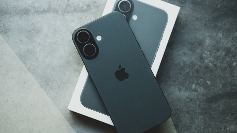 iPhone 17 on top of its box.