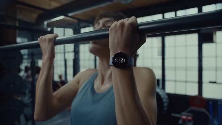 A woman exercising wearing Google Pixel Watch 4