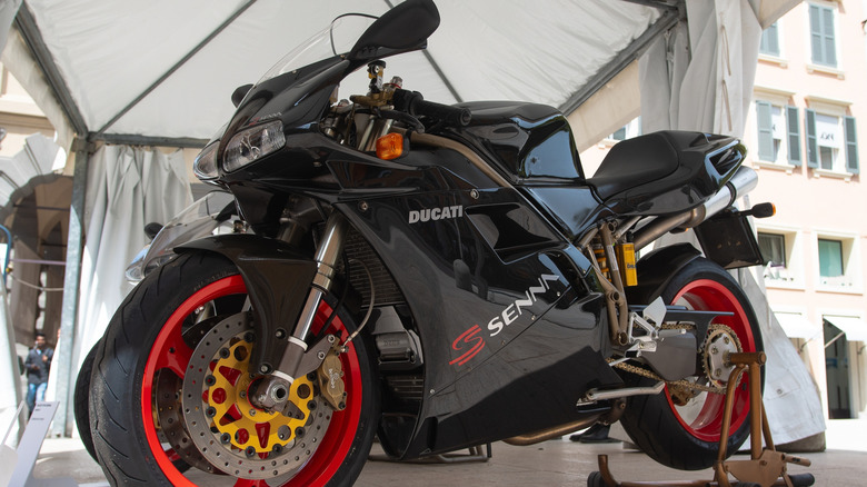 A black Ducati Senna III on display.