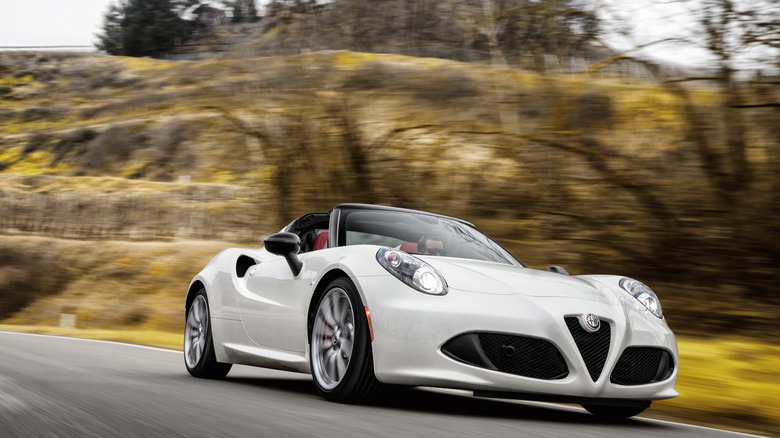 Alfa Romeo 4C driving at speed front 3/4 view