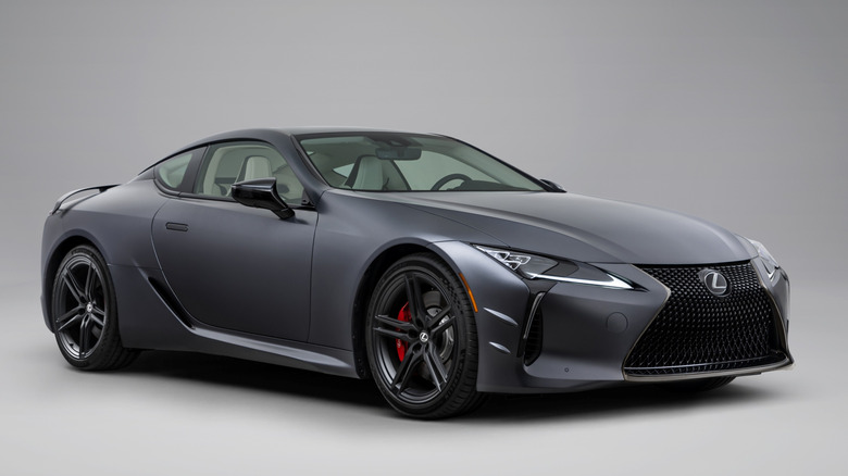 Front 3/4 view of gray Leuxs LC 500 parked in studio.