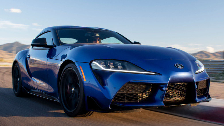 Front 3/4 view of Toyota GR Supra in track setting
