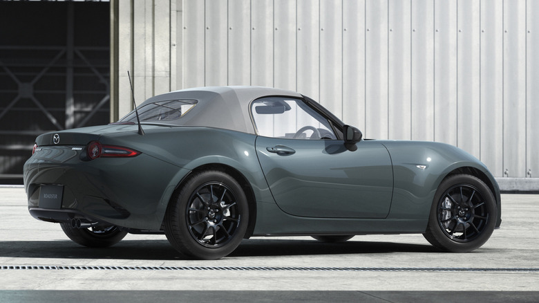 Rear 3/4 view of Mazda Miata roadster in new Zinc Green color