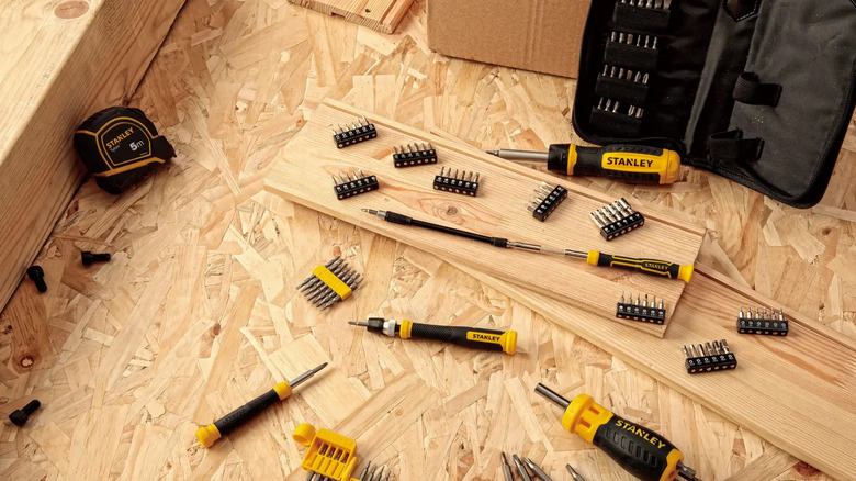 Stanley tools and accessories arranged on wooden boards