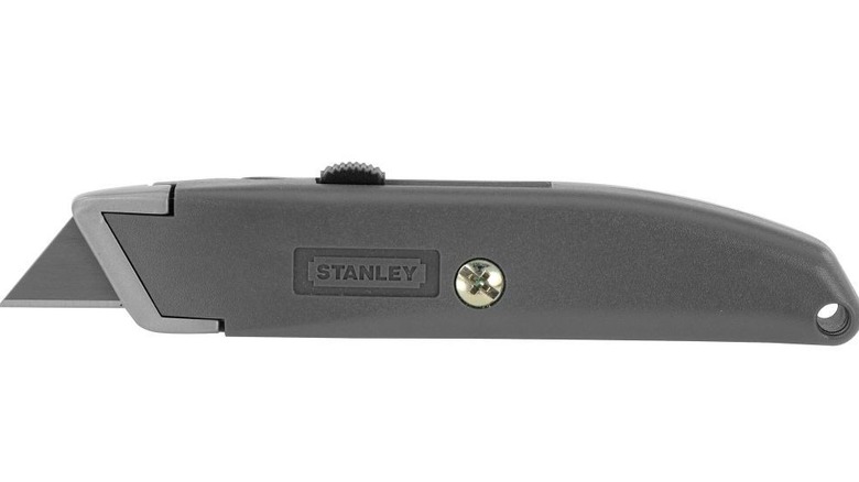 Gray Stanley Homeowners Retractable Knife with exposed metal blade
