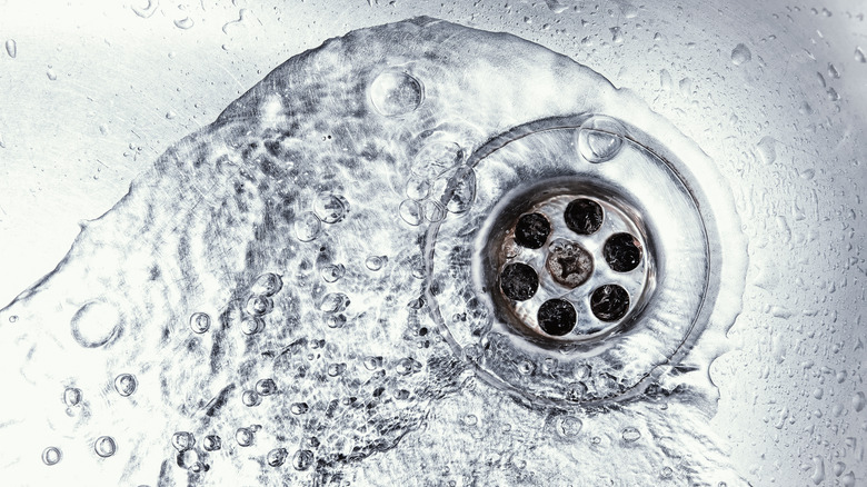 Water going down sink drain