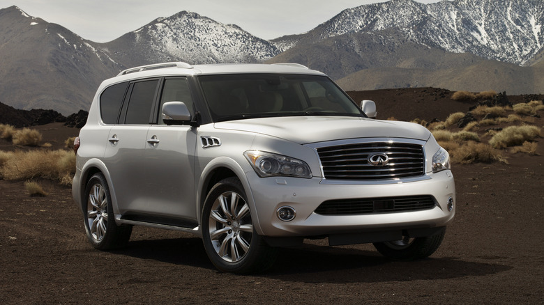 A white 2011 Infiniti QX56 parked