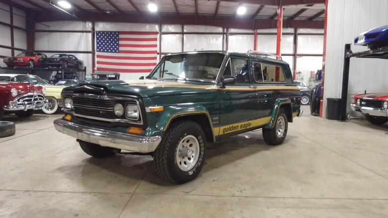 A front quarter shot of a green 1980 Jeep Cherokee