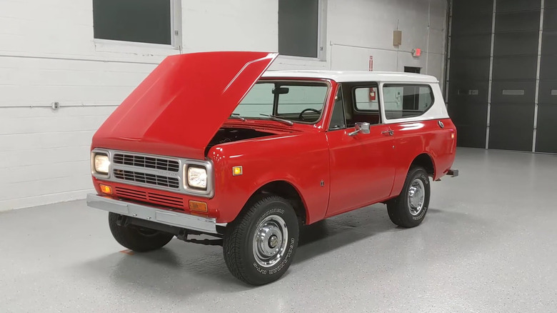 A side on shot of a red 1980 International Harvester Scout II