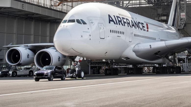 A standard Porsche Cayenne has towing an Air France Airbus A380 weighing 285 tons