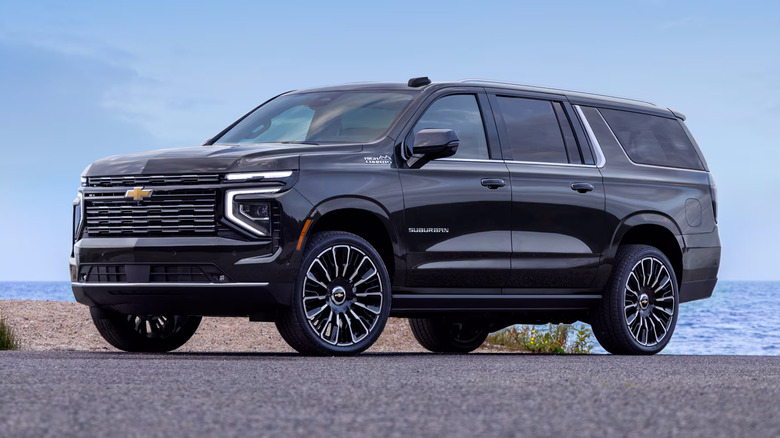 A black 2025 Chevrolet Suburban parked