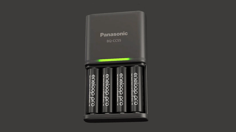 Eneloop rechargeable batteries shown in a Panasonic charger