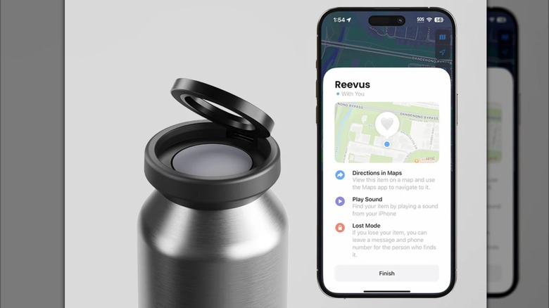 A water bottle next to an iPhone with Find My app launched