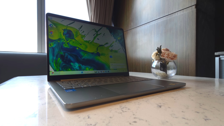 The Acer Swift Air 14 on a hotel room table