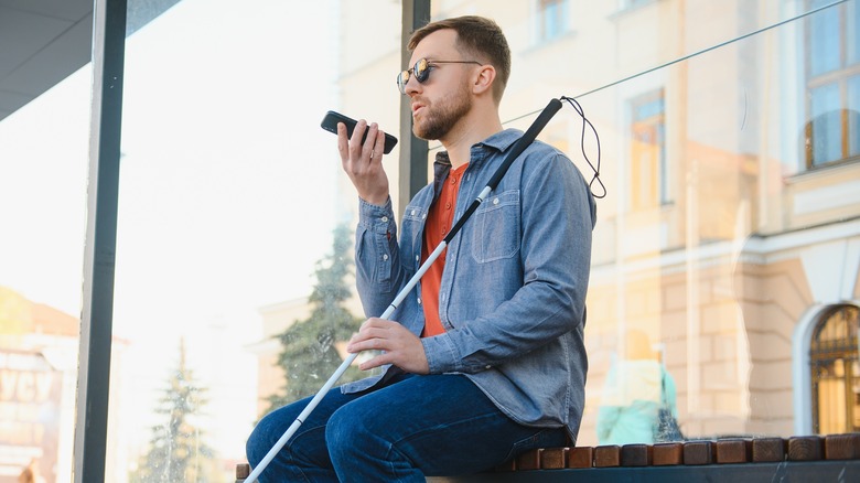 blind man using phone