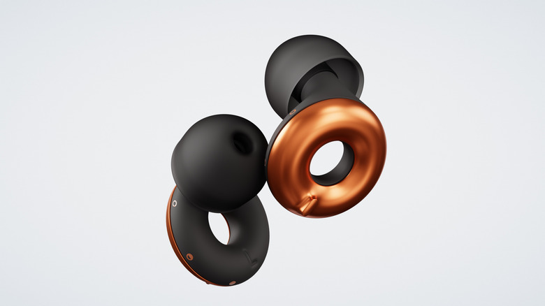 A pair of Loops Switch earplugs on white background