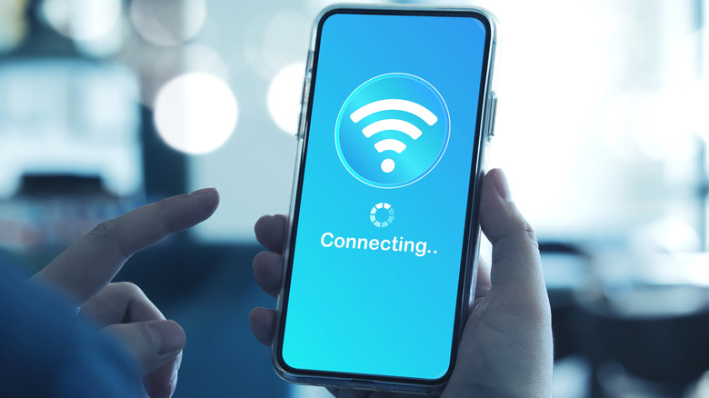 Smartphone shows mockup of Wi-Fi connection interface